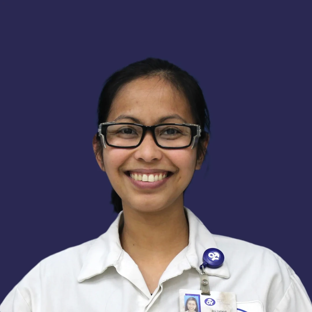 Female employee smiling.