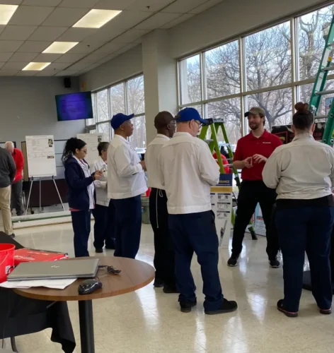 Group of employees doing a safety workshop.